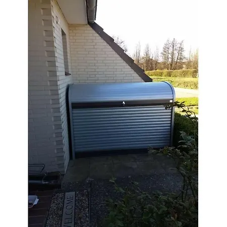 Next Door To *